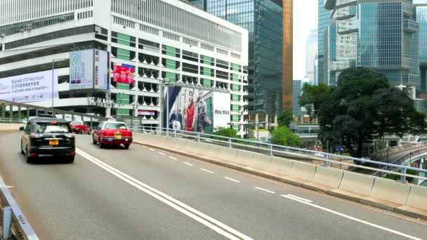 HONG KONG - Verkeer in het moderne stadscentrum. 4K-resolutie. — Stockvideo