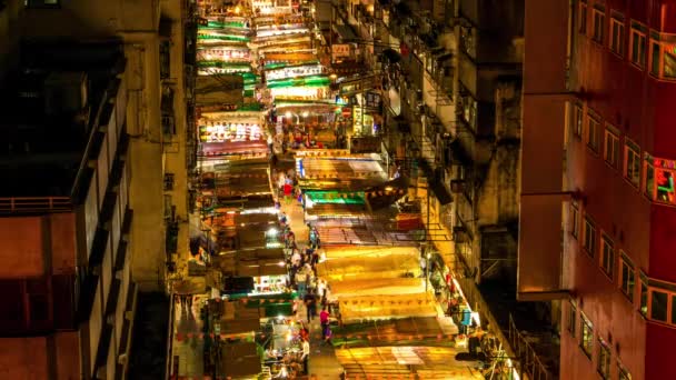 HONG KONG - Νυχτερινή αγορά εναέρια άποψη του δρόμου. Λήξη χρόνου ανάλυσης 4K. — Αρχείο Βίντεο