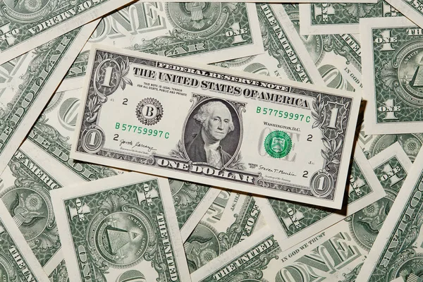 Een Achtergrond Met Amerikaanse Een Dollar Biljetten — Stockfoto