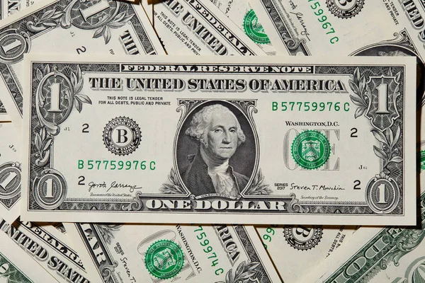 Een Achtergrond Met Amerikaanse Een Dollar Biljetten — Stockfoto