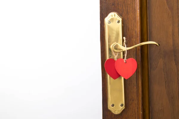 door with heart card hanging