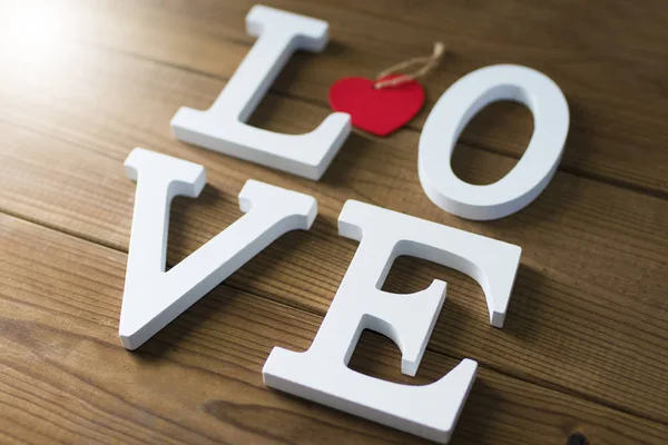 Hou Letters Een Houten Achtergrond — Stockfoto