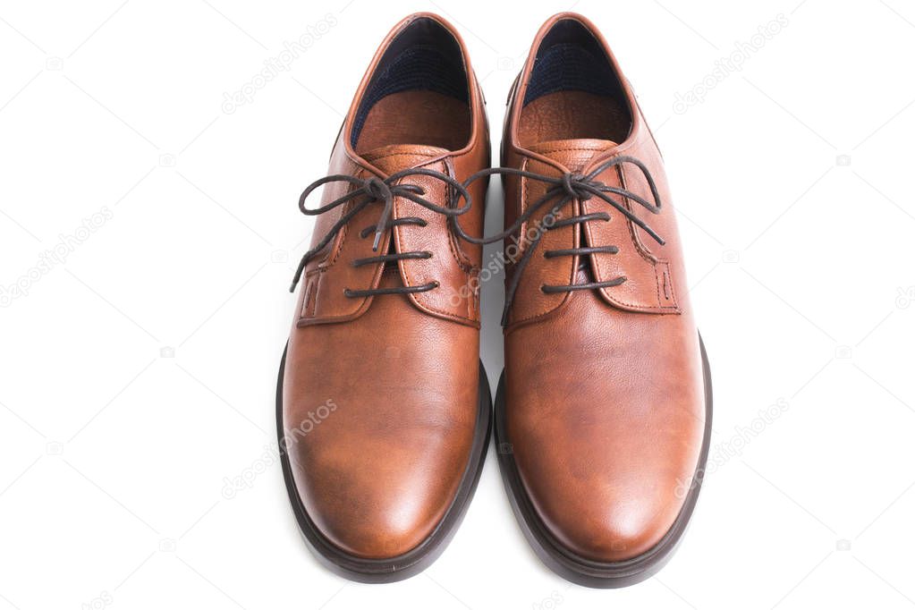 brown leather shoes insulated in white background