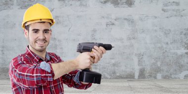 İnşaat işçisi ve matkap ve metin için yer ile konut