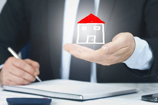 man signing the purchase or rent of house, real estate