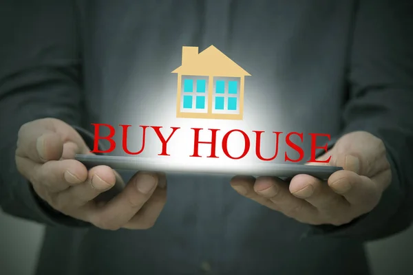 hands with device and concept of buying house