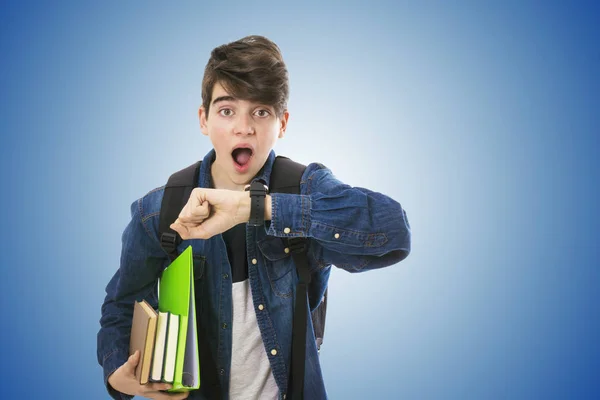 student with books looking at the clock surprised of the schedule