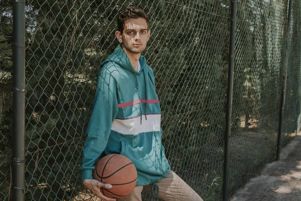 young athlete with basketball