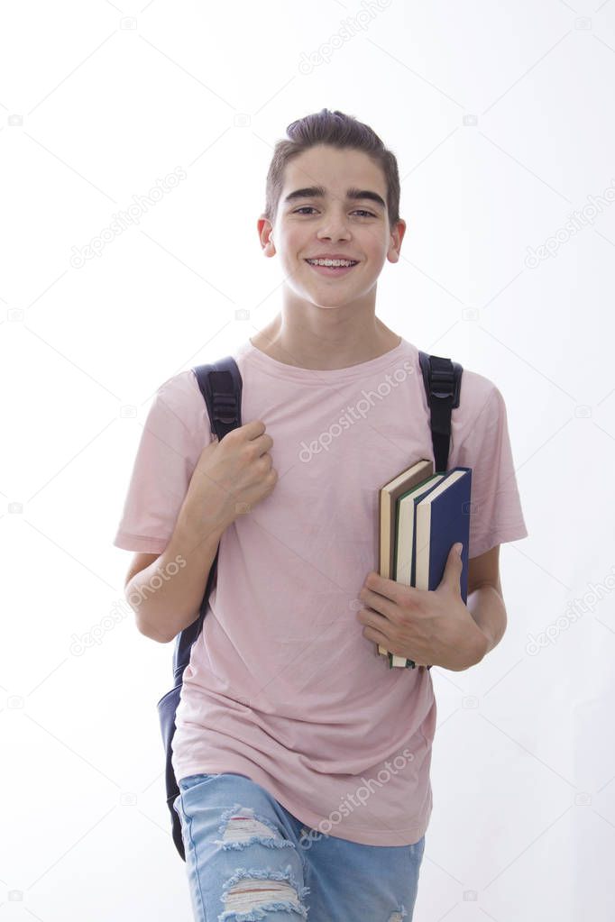 student with books and backpack isolated in white background