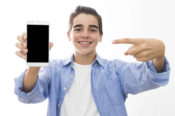 Young Smiling Pointing Mobile Phone — Stock Photo, Image