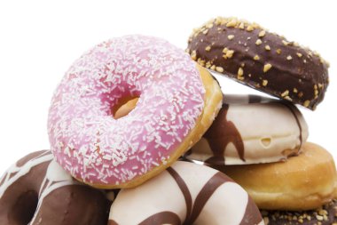 Donuts ve şeker ile farklı tatlar yığılmış