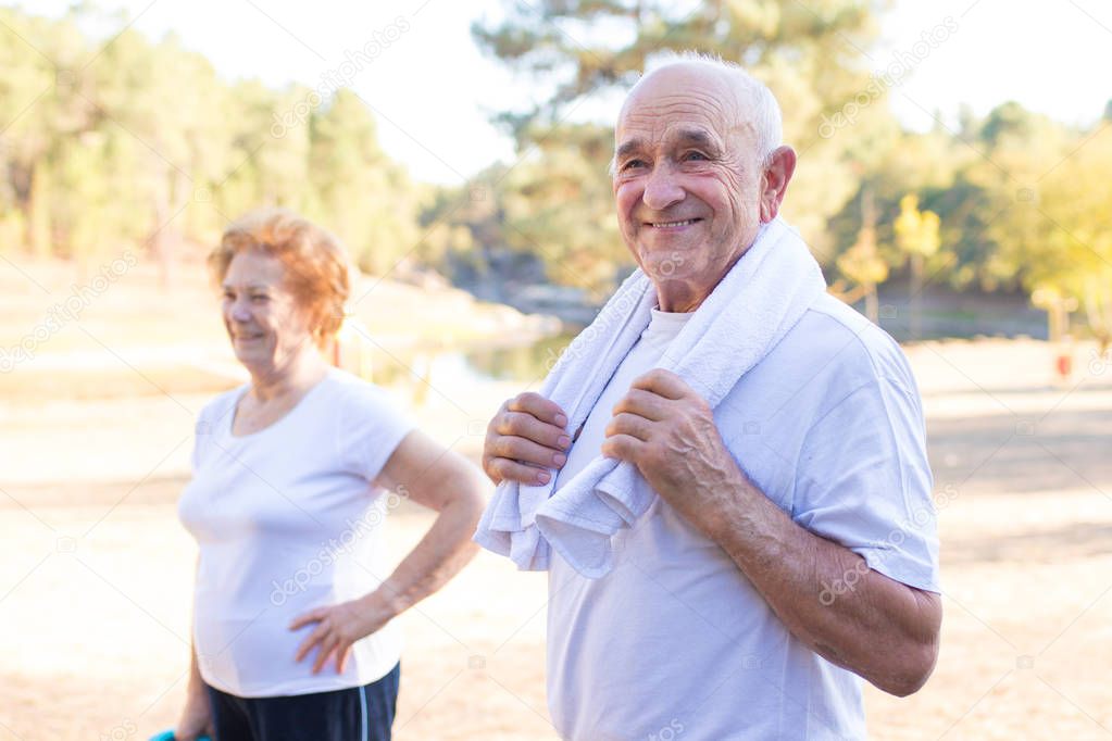 happy older people doing outdoor sports