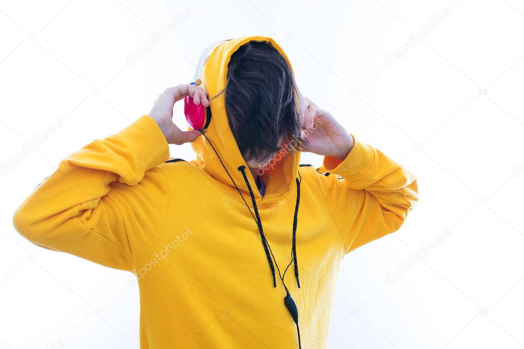 young listening to music with headphones