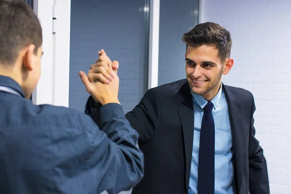 business people waving with their hands, success