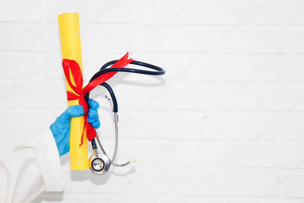 doctor with diploma and graduation in medicine