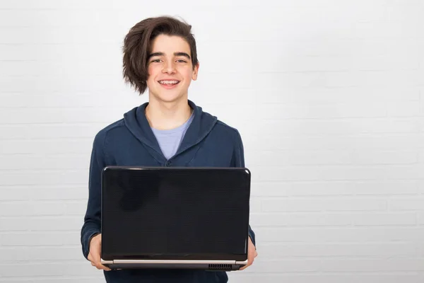 student with laptop on white background