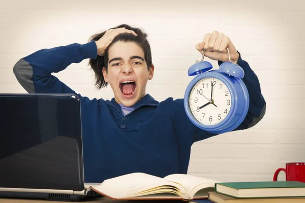 Young Student Laptop Desk Clock — ストック写真