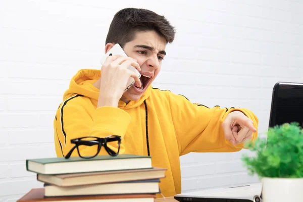 Angry Young Man Mobile Phone Laptop Arguing Screaming — Stock Photo, Image