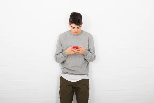 Young Man Wall Mobile Phone — 스톡 사진