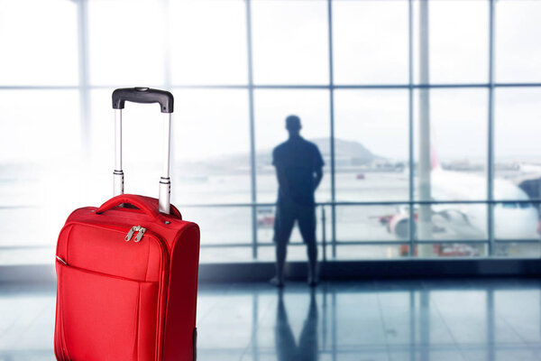 suitcase at the airport, transportation and travel