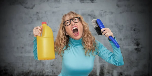 woman stressed with cleaning products