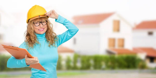 woman building, architect or real estate with houses and buildings