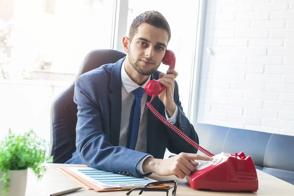 businessman or executive with vintage phone