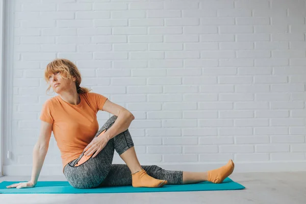 woman doing sports at home or gym