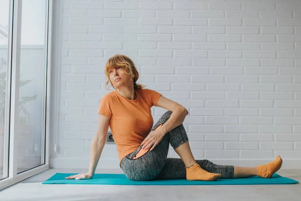 woman doing sports at home or gym