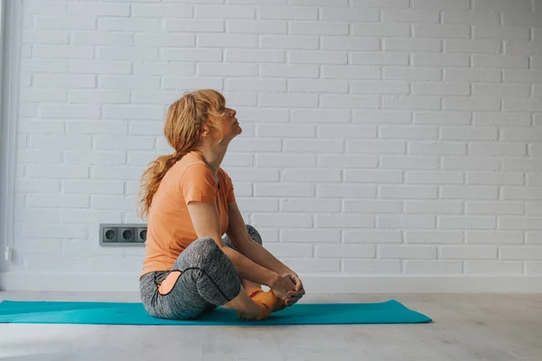 woman doing sports at home or gym