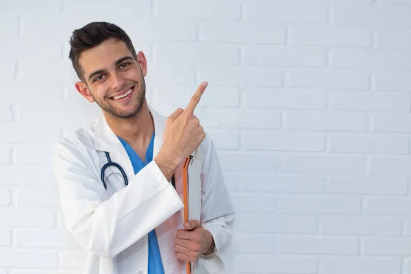 Doctor Pointing Out Wall Background — Stock Photo, Image