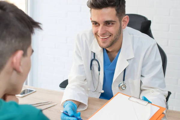doctor in consultation with patient, health and medicine