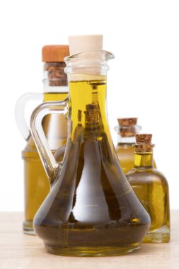 isolated olive oil bottles on a white background