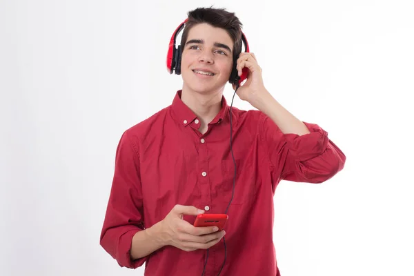 Jeune Homme Adolescent Avec Téléphone Portable Écouteurs Isolés Sur Blanc — Photo