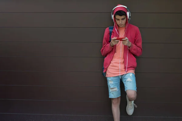 Young Man Student Mobile Phone Headphones Outdoors — ストック写真