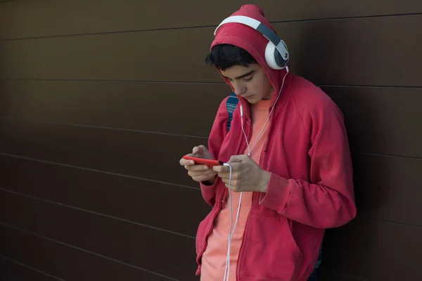 Young Man Student Mobile Phone Headphones Outdoors — ストック写真