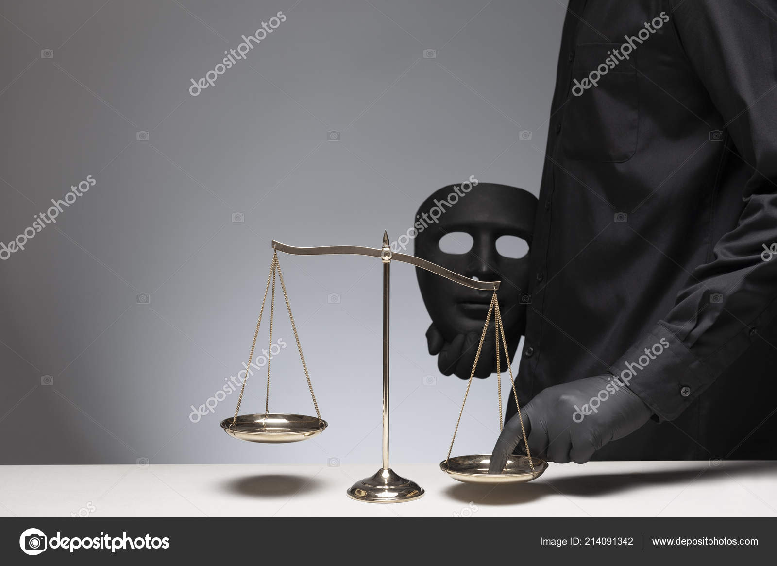Man Holding Black Evil Mask One Hand Pressing Scale Gray Stock