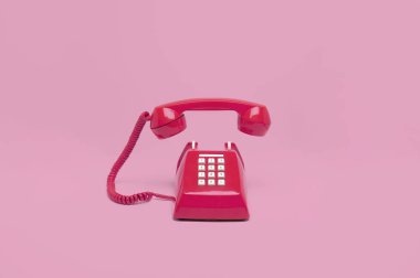 Pembe telefonla Retro: pembe bir arka plan, Vintage tarzı renkler.