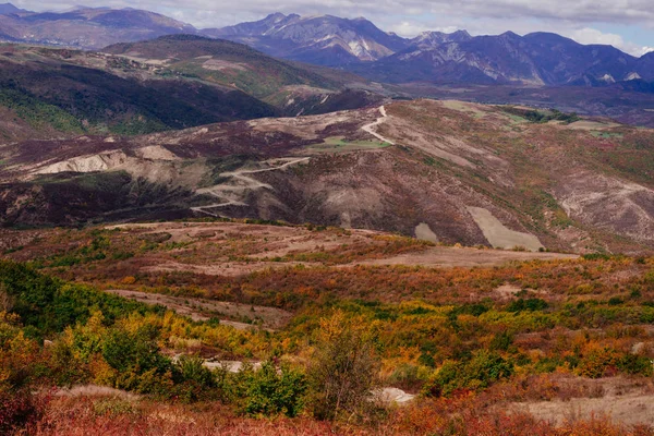 Magic enchanting nature, mountain slopes and hills covered with plants and trees, autumn landscape — Stock Photo, Image