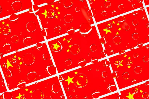 Flags  of China behind a glass covered with rain drops.Pattern from Chinese flags