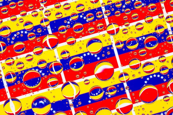 Flags  of Venezuela, behind a glass covered with rain drops.Pattern from flags of Venezuela