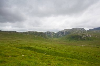 Manzara Dunlewey veya Dunlewy. Bu bir County Donegal, Ireland Gweedore alanında küçük Gaeltach köyüdür. Zehirli Glen Mount Errigal ve Dunlewey Lough kıyıya oturur.