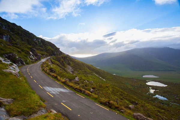 The Conor Pass is the highest mountain pass in Ireland. It is situated on the Dingle Peninsula in County Kerry, on the road that crosses the peninsula between Dingle Town and the coast the other side.