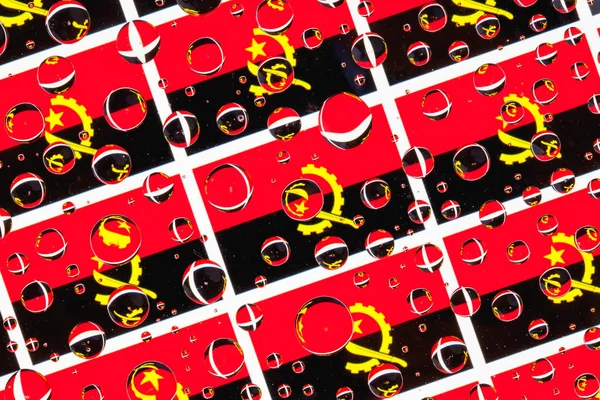 Flaggor Angola Bakom Ett Glas Täckt Med Regndroppar Mönster Från — Stockfoto