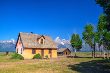 The T. A. Moulton Barn is a historic barn in within the Mormon Row Historic District in Teton County, Wyoming, United States clipart
