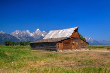 The T. A. Moulton Barn is a historic barn in within the Mormon Row Historic District in Teton County, Wyoming, United States clipart