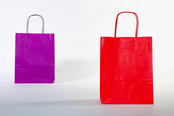 カラフルな空ショッピング バッグ白の表現が上分離されてのセット — ストック写真