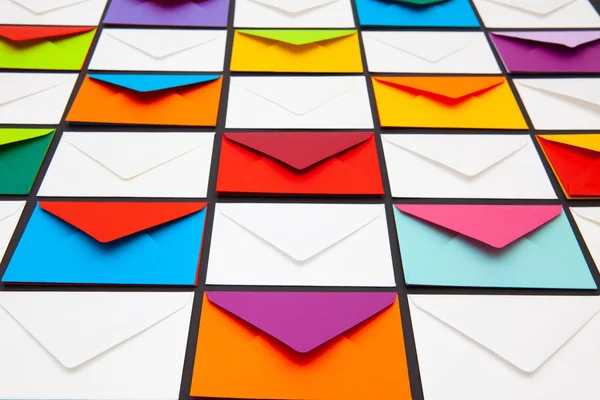 Composition with white and colored envelopes on the table. — Stock Photo, Image
