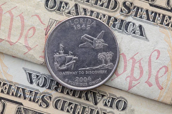 미국 달러 지폐와 플로리다의 분기의 대칭 구성 — 스톡 사진