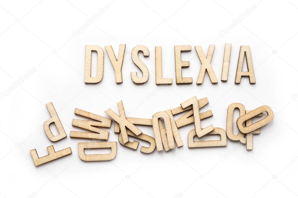 Dyslexia concept, word spelled out in wooden letters
